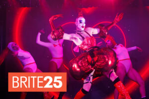 Drag artists perform on stage at Oasis SF.